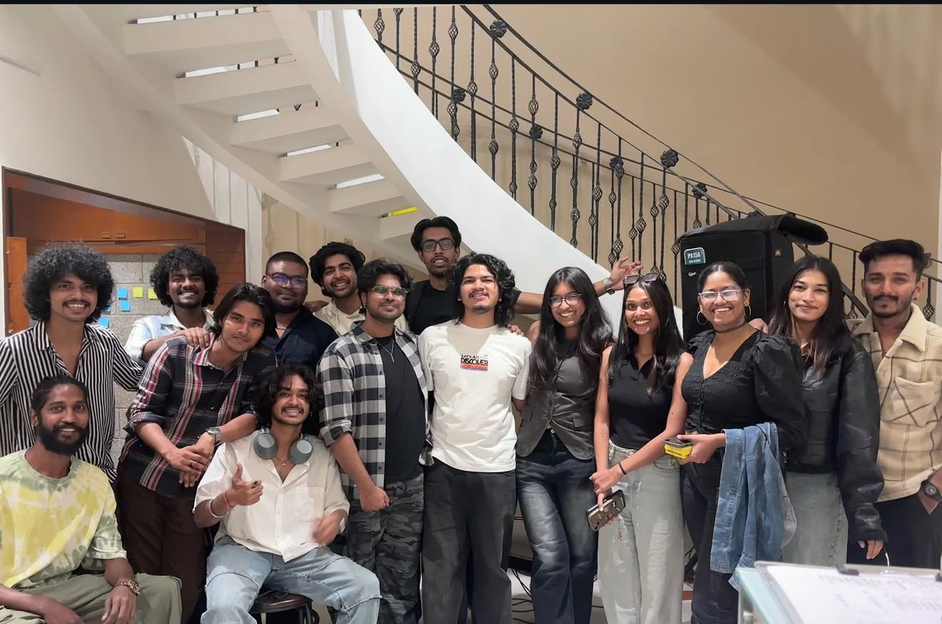 The Unplug Collective community gathered on a staircase